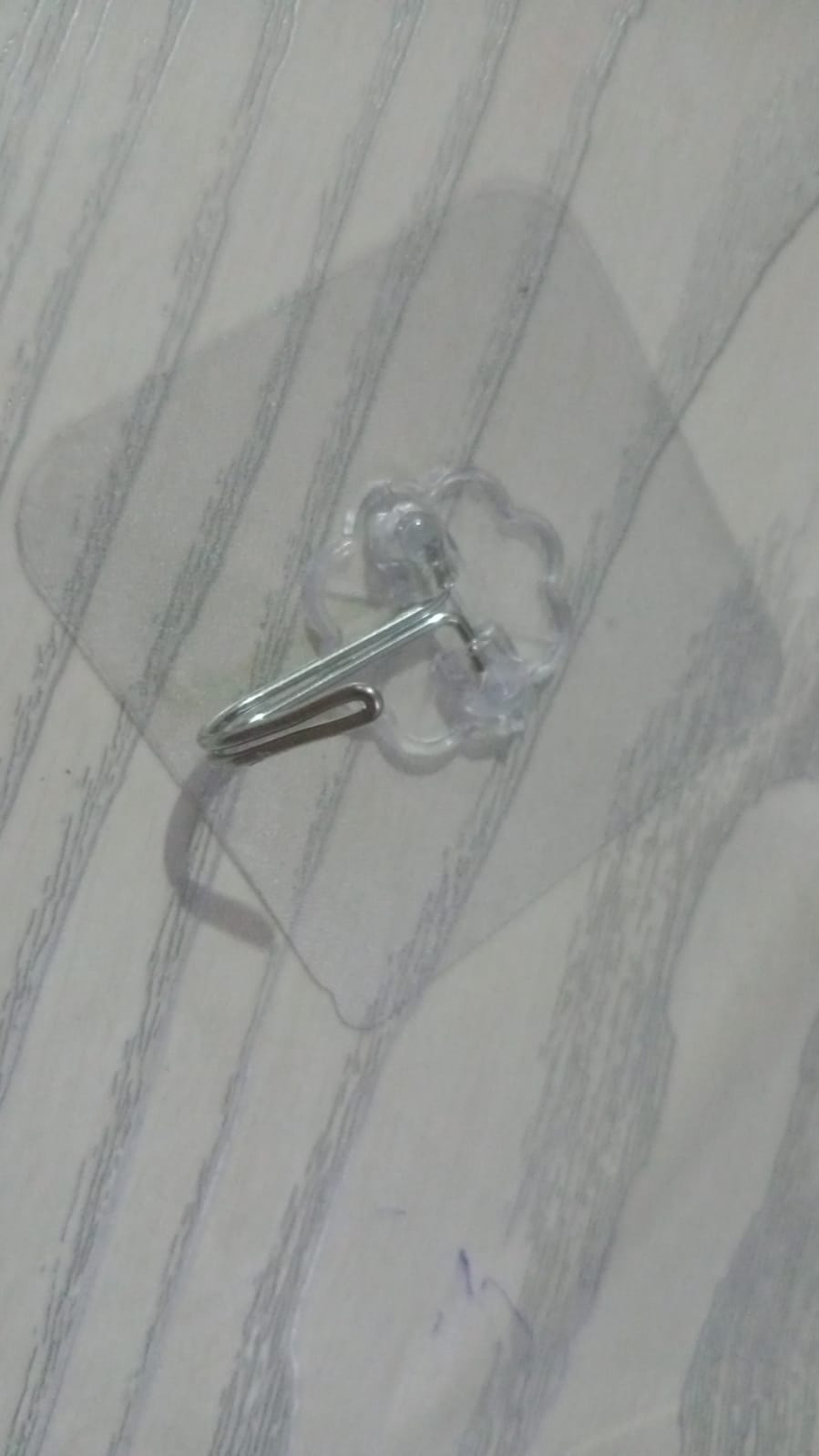 Stainless steel adhesive hooks for secure hanging in multiple rooms Stainless steel adhesive hooks for secure hanging in multiple rooms